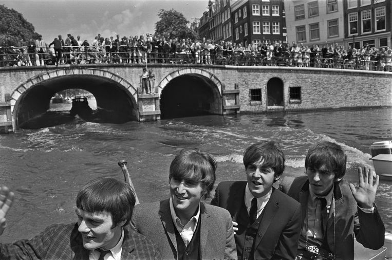 Rondvaart door Amsterdam, 1964. Beeld ANP