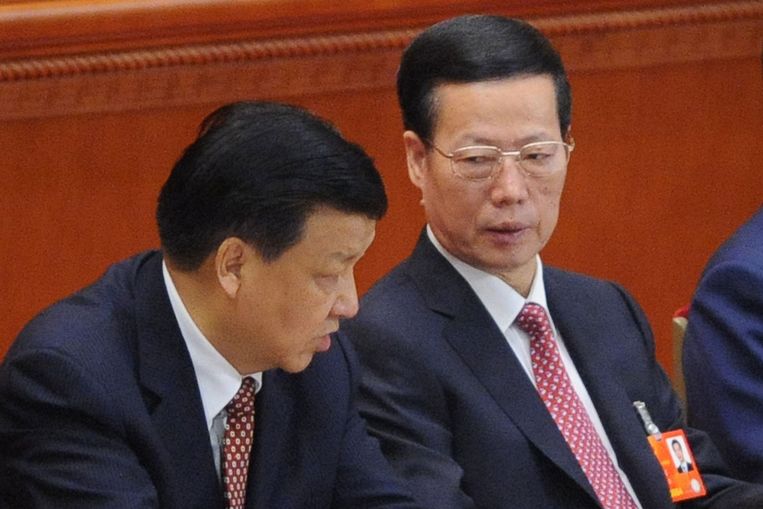 De voormalige Chinese vicepremier Zhang Gaoli (rechts) op archiefbeeld uit 2013. Beeld AFP