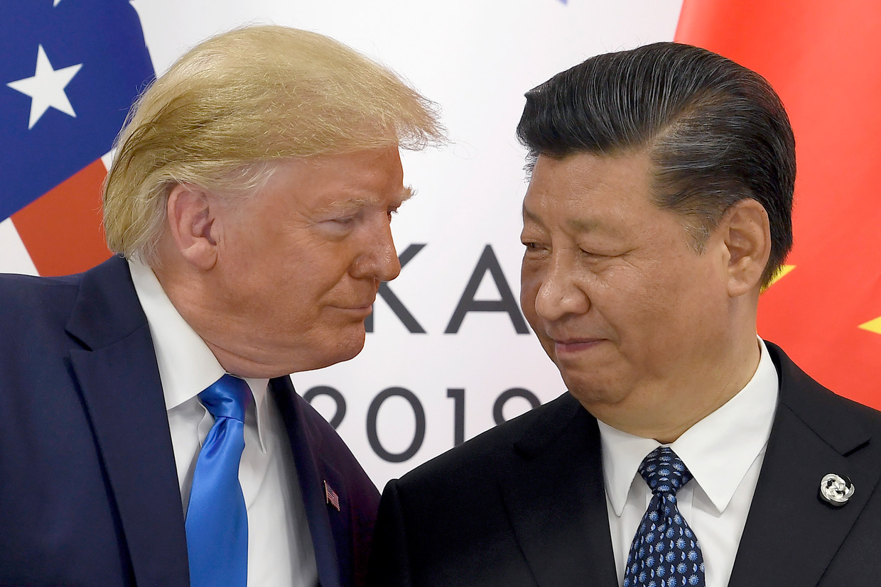 De Amerikaanse president Donald Trump samen met zijn Chinese collega Xi Jinping tijdens een ontmoeting in juni. 