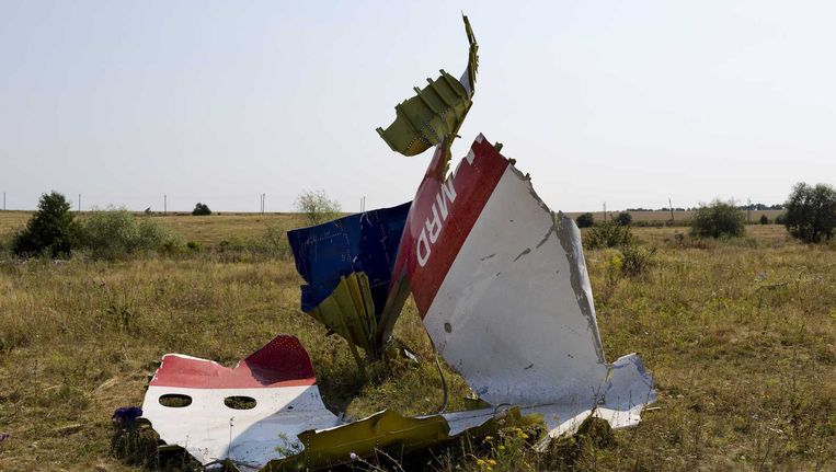 Restanten van de Malaysia Airlines Boeing in het rampgebied, drie weken na de crash van vlucht MH17 Beeld anp