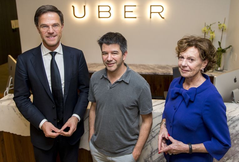 Mark Rutte, Uber-topman Travis Kalanick en Neelie Kroes op het hoofdkantoor van Uber in San Francisco. Beeld ANP