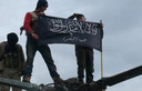 Leden van het al-Nusrafront tonen hun vlag in Syrië. Khorasan wordt nadrukkelijk gelinkt aan al-Nusra.