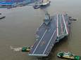 Le Fujian sort du port pour son premier essai en mer.