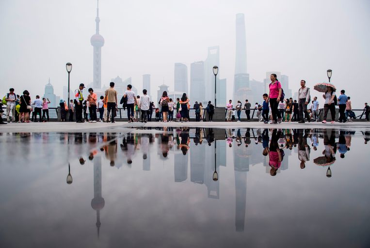 Toeristen in de Chinese stad Shanghai. Beeld AFP