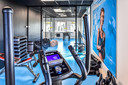 Het Enschedese ict-bedrijf Exite beschikt over een eigen fitnessruimte in het kantoor.