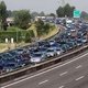 Vakantie-uittocht naar zuiden over piek heen