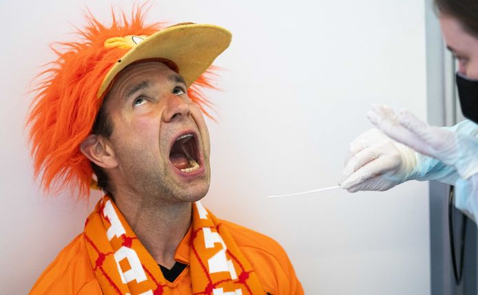Orange fans during a corona test in the RAI prior to the football match during the European Football Championship of the Netherlands against Ukraine.