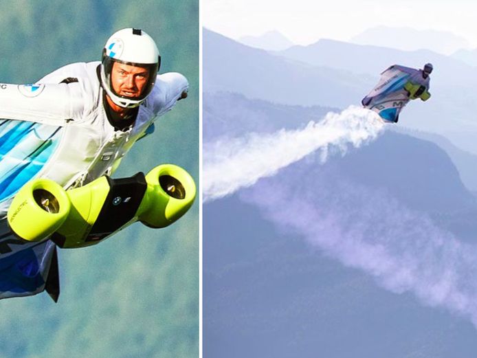 Peter Salzmann vliegt met zijn elektrisch aangedreven wingsuit van BMW boven de Alpen.