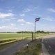 Rijkswaterstaat gaat vlaggen en spandoeken boeren verwijderen
