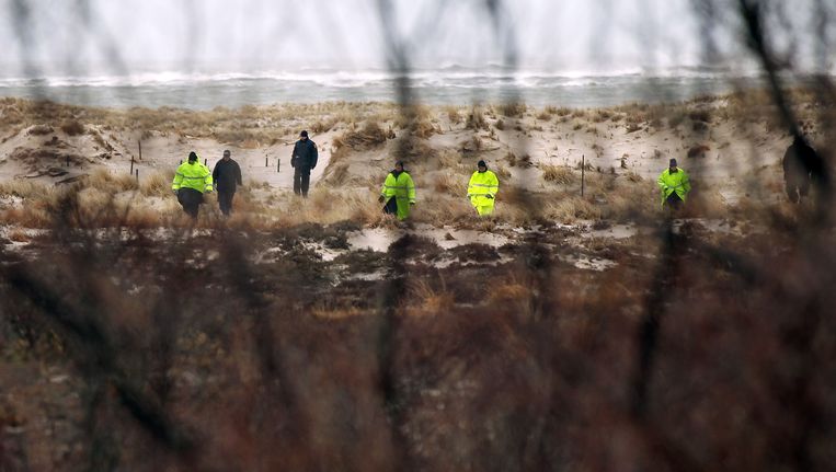 Zoektocht naar lichamen op Long Island, afgelopen april. Beeld AFP