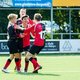 Linksbuiten Meesam Rahimi (2002 - 2018) vloog over het veld