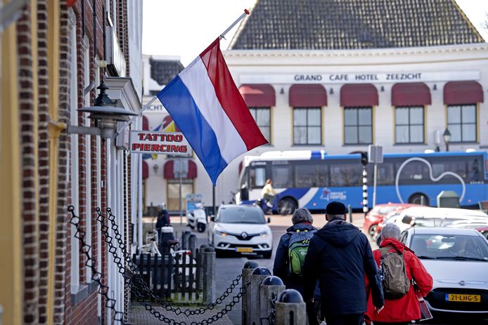 A flag hangs at half-mast at the harbour.