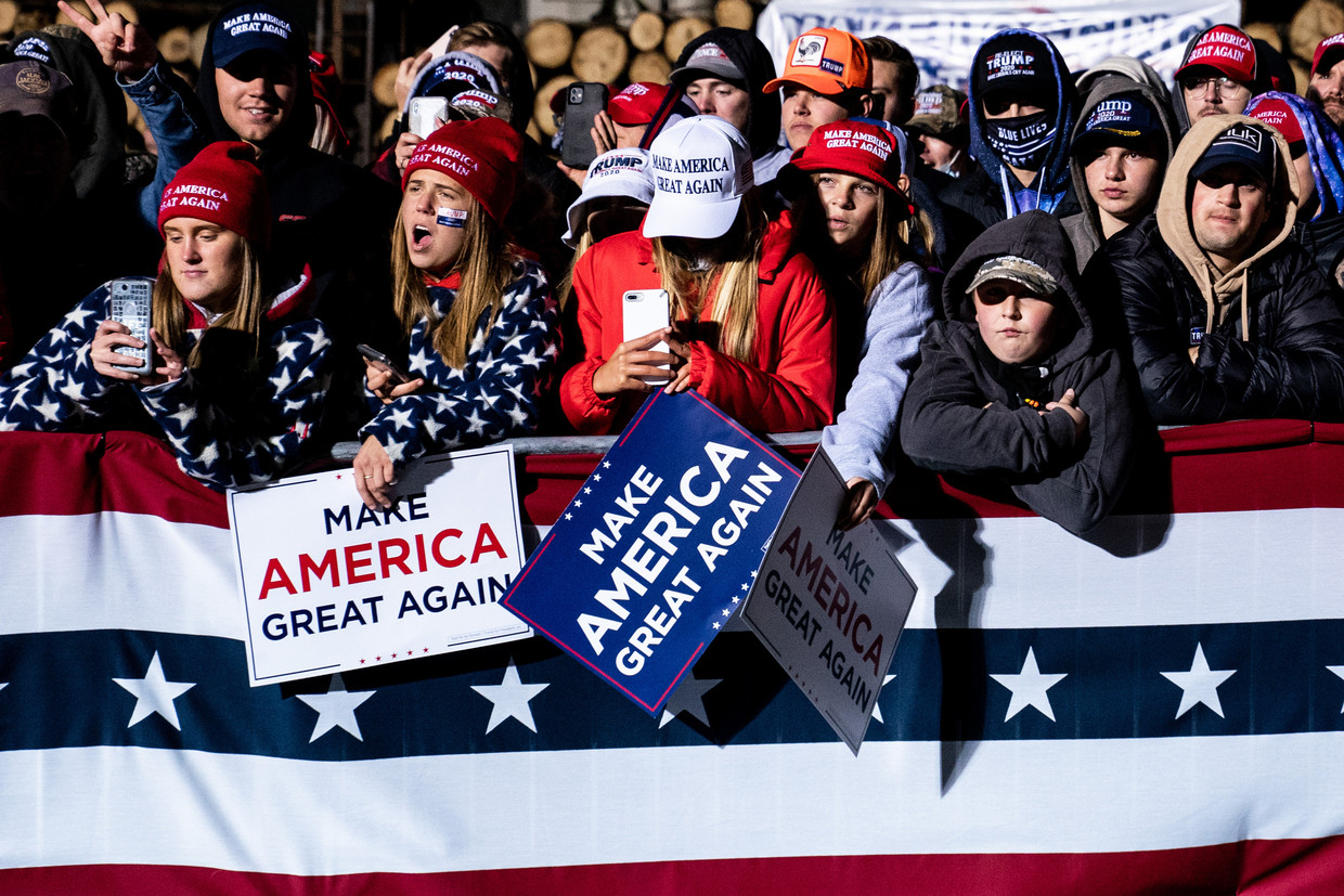 Trump-aanhangers tijdens een campaign rally in Duluth, Minnesota, op 30 september. Beeld NYT/ERIN SCHAFF
