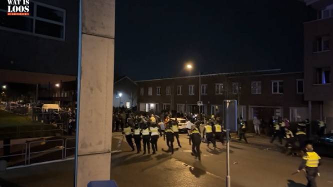 KIJK. Illegale raveparty in Maastricht met ook Belgen beëindigd: beelden tonen hoe politie feestvierders met honden en wapenstok verjaagt