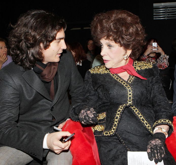 Gina Lollobrigida (right) and her lover Andrea Piazzolla (left) in 2013