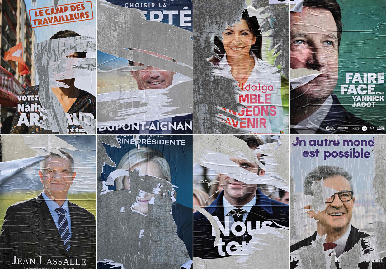 Affiches van Franse presidentskandidaten, met middenonder Marine Le Pen en Emmanuel Macron. Beeld AFP