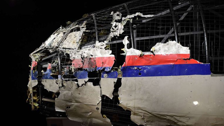 De gehavende romp van vlucht MH17, tentoongesteld tijdens de presentatie van het onderzoeksrapport naar de toedracht van de ramp in oktober 2015 Beeld afp
