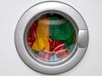 washing machine - filled with colorful laundry