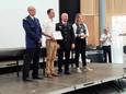 Korpschef Rasschaert, jeugdcoördinator Stefaan en jeugdinspecteur Cleo ontvangen de communityprijs van Quebec