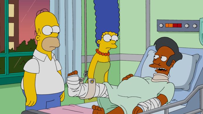 Het The Simpsons-personage Apu Nahasapeemapetilon met Homer en Marge.