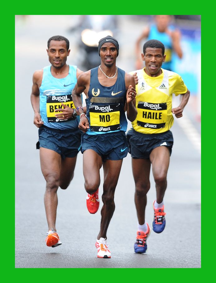 Haile Gebrselassie (r) en Mo Farah (m) met Kenenisa Bekele (l) tijdens de Great North Run in september 2013 in Gateshead.