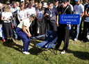 Annika Sorenstam uit Zweden staat klaar om een bal vanaf een campingstoel af te slaan na een afzwaaier even daar voor. US Solheim Cup at Barseback Golf & Country Club in Loddekopinge, Sweden, 14 September 2003.