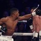 Bokser Joshua verslaat Parker in gevecht om wereldtitels