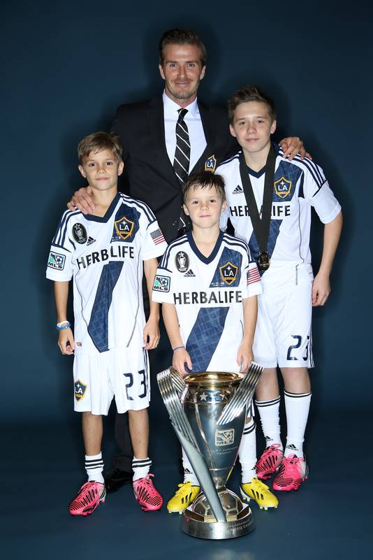 David Beckham met zijn zoons Romeo, Cruz en Brooklyn na de winst van de MLS Cup in 2012.