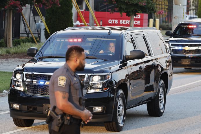The car carrying former President Donald Trump arrives at the Fulton County Jail in Atlanta.