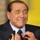 Berlusconi blijft lachen