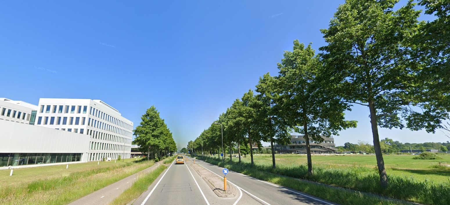 De Mansholtlaan in Wageningen. Links Frieslandcampina op de campus, links het terrein van de toekomstige Born-Oost.