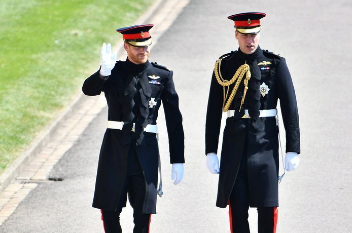 De prinsen Harry en William tijdens die eerste zijn huwelijk met Meghan Markle op 19 mei 2018.