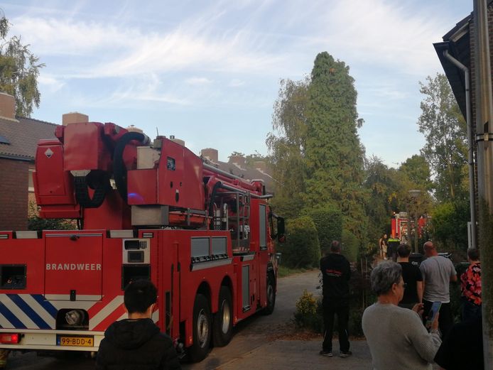 Rookontwikkeling door brand in een wasmachine.