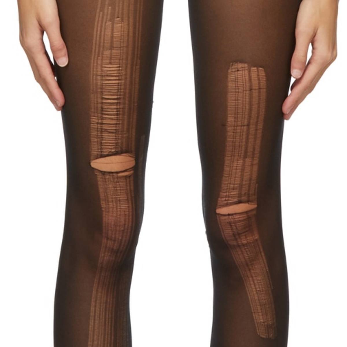 Gucci vend des collants dechires a un prix exorbitant Tendances 7sur7.be