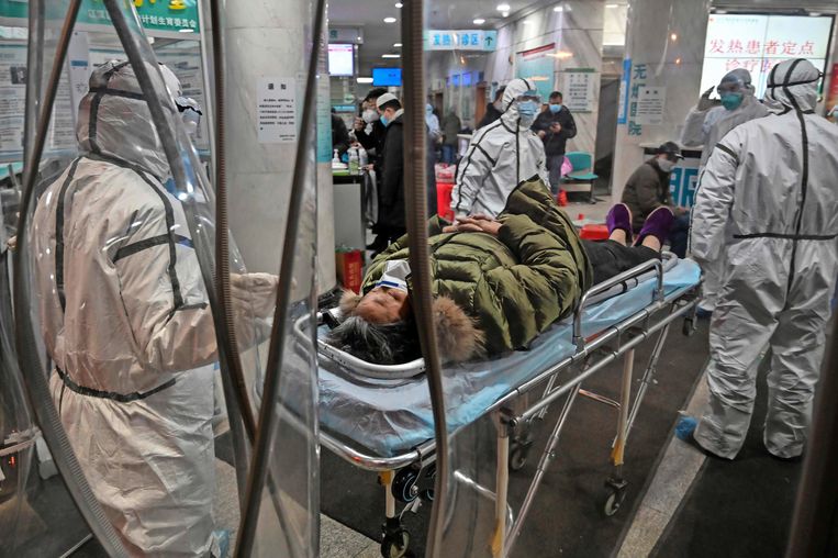 De coronaziekte brak uit in het Chinese Wuhan. Beeld AFP