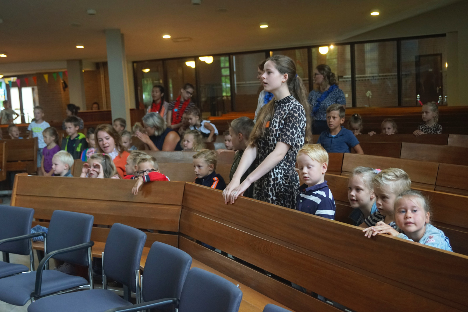 Met de ‘Vakantie Bijbel Week’ in augustus probeert de kerk in Bunschoten al jaren kinderen aan zich te binden. Beeld Hollandse Hoogte 