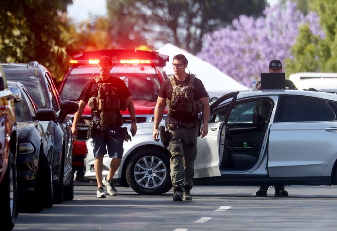 LAGUNA WOODS, CALIFORNIA - MAY 15: Police investigate the scene of a shooting at the Geneva Presbyterian Church on May 15, 2022 in Laguna Woods, California. According to police, the shooting left one person dead, four critically wounded, and one with minor injuries.   Mario Tama/Getty Images/AFP
== FOR NEWSPAPERS, INTERNET, TELCOS & TELEVISION USE ONLY ==