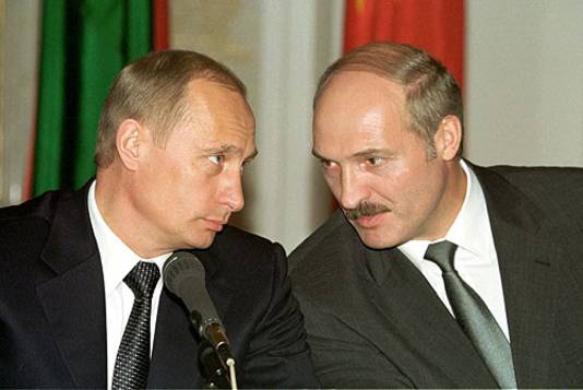 Poetin en Loekasjenko (archiefbeeld ter illustratie)