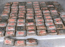 An undated handout photo received on December 16, 2020 from the Marshall Islands Police Department shows blocks of cocaine from an 18-foot fiberglass boat washed up on Ailuk Atoll, a remote atoll with about 400 people, in the Marshall Islands last week with 649 kilos (1,340 pounds) of cocaine sealed in its hold under the deck. (Photo by - / MARSHALL ISLANDS POLICE DEPARTMENT / AFP) / ----EDITORS NOTE ----RESTRICTED TO EDITORIAL USE MANDATORY CREDIT " AFP PHOTO / MARSHALL ISLANDS POLICE DEPARTMENT" NO MARKETING NO ADVERTISING CAMPAIGNS - DISTRIBUTED AS A SERVICE TO CLIENTS