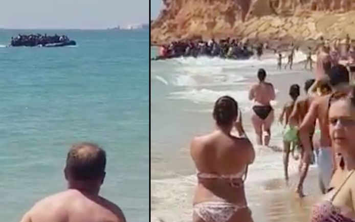 Strandgangers kijken toe hoe de vluchtelingen uit het bootje springen en het meteen op een lopen zetten. Even later verdwijnen ze tussen de rotsen, weg van de zee.