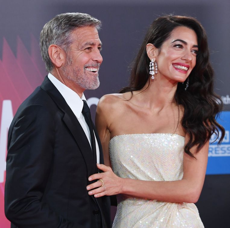 'Als ik al op mijn 20ste al dat geld, die vrouwen en die cocaïne had gehad, dan had ik nu niet hier gezeten.’ (Foto: met zijn vrouw Amal.) Beeld ISOPIX