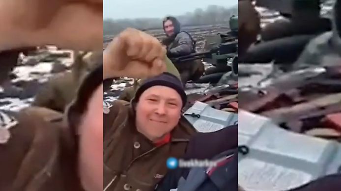 Oekraïners maken een plezierritje op een Russische tank.