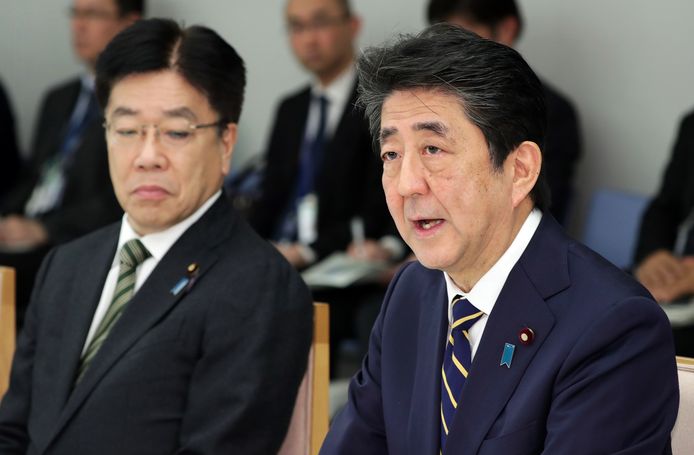 Shinzo Abe (rechts).